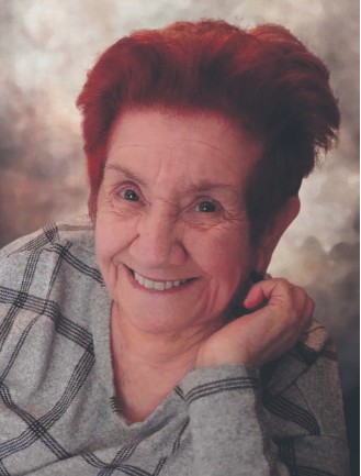 Mme Denise Désilets
