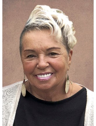 Mme Carole Simard