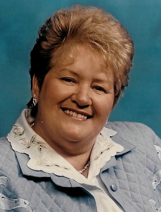 Mme Émilienne Côté
