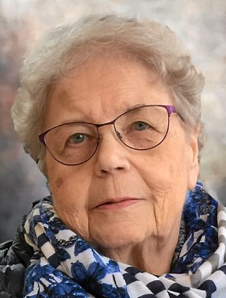 Mme Louise Giguère