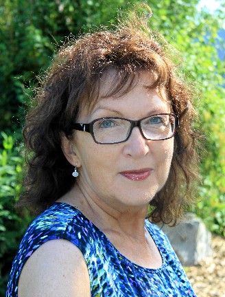 Mme Lisette Simard