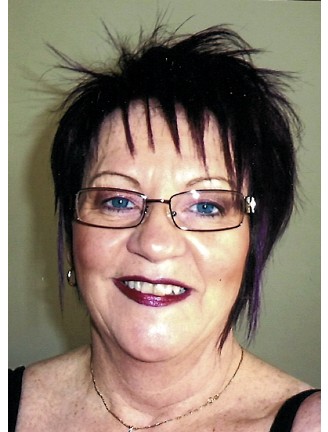 Mme Estelle Harvey