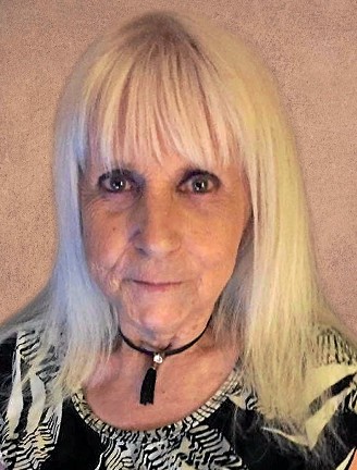 Mme Denise Corneau