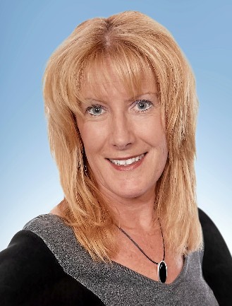 Mme Marie Héroux