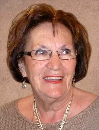 Mme Louise Brassard