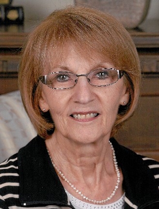 Mme Monique Girard