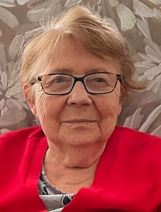 Mme Doris Huot
